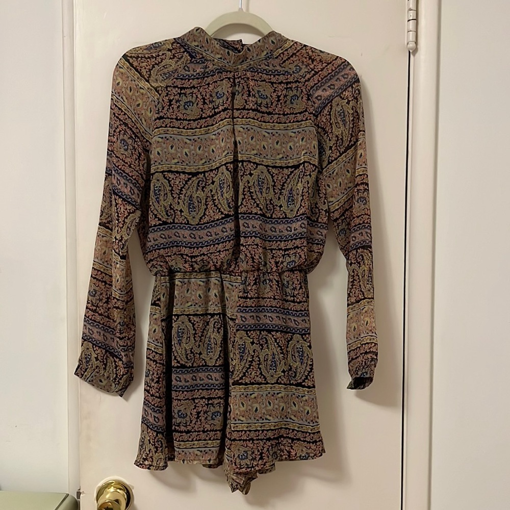 Keyhole neck, open back romper!